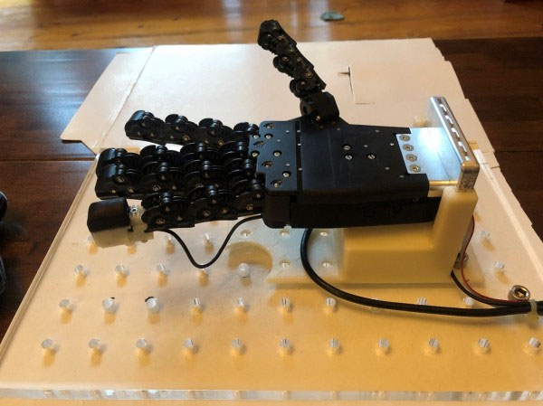 Robotic hand with a 3D-printed tactile fingertip