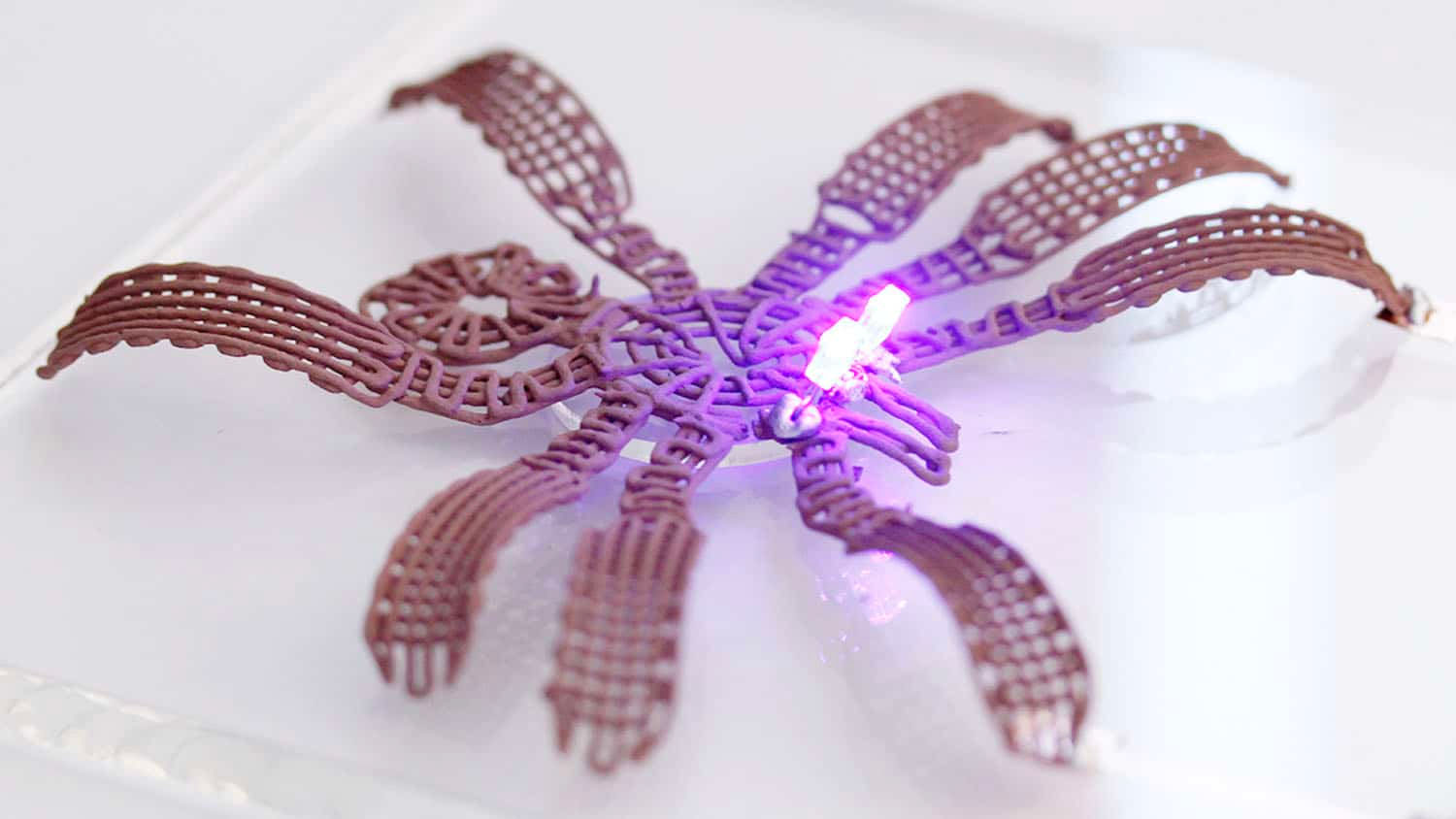 This image shows a metallic spider that was printed at room temperature using the metallic gel, and which assembled and solidified into its final 3D shape via 4D printing