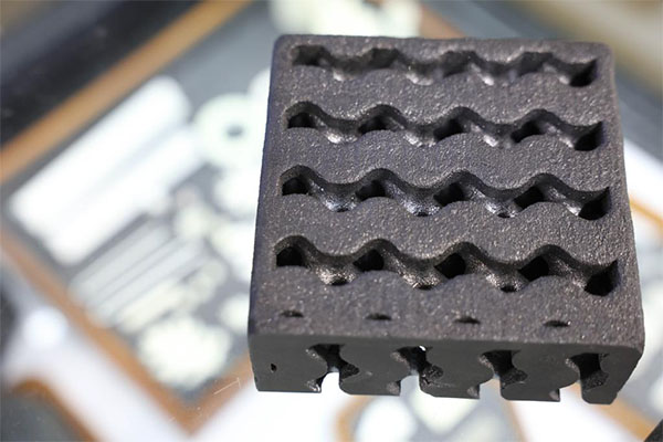 This component was 3D-printed, filled with a silicon-carbide pre-ceramic polymer and heat-treated to produce amorphous silicon carbide