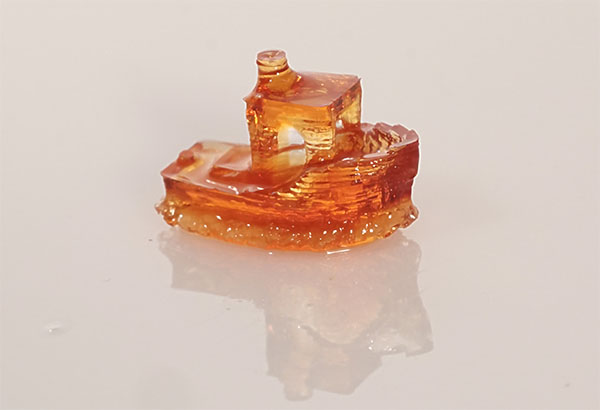 3D printed glass structure in the shape of a boat