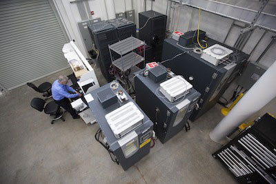 Machines in the Wisconsin Energy Institute high-bay lab provide insight into how microgrid systems will interact with the grid