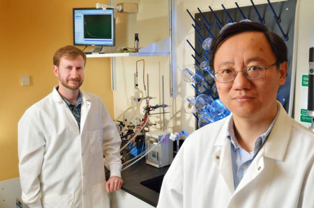 Virginia Tech professor Percival Zhang (right) and recent doctoral graduate Joe Rollin