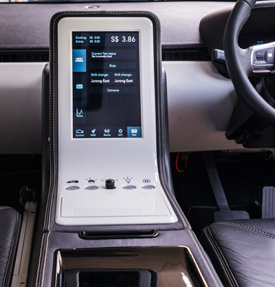 EVA has a built-in infotainment system which can display fares, navigate with maps and play music from the radio