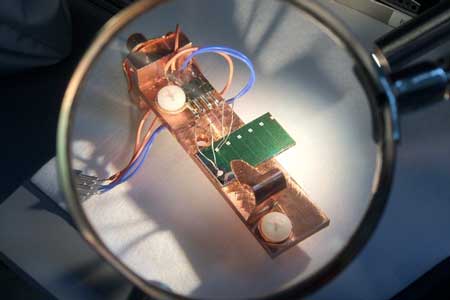 experimental setup to measure the electrical output of a sample of solar cell material