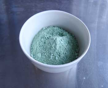 green powder in a cup