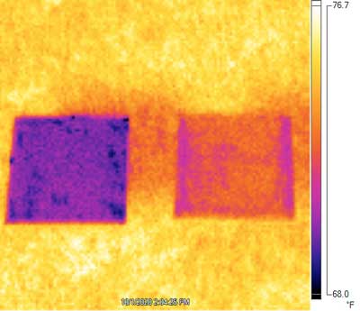 An infrared camera image with two differently colored squares against a yellow background