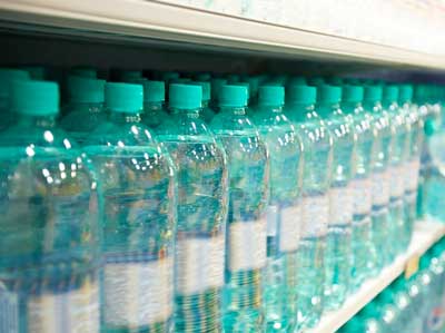 plstic water bottles on shelf