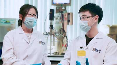 Associate Professor He Jianzhong (left) and Research Fellow Dr Wang Qingkun (right)