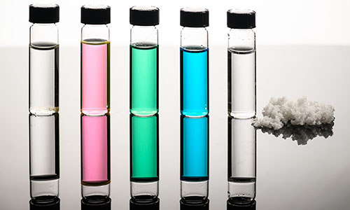 Vials of seawater, Great Salt Lake water, nickel sulfate, copper chloride wastewater, and desalinated water, along with recovered salts