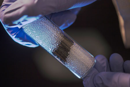 chloroform-contaminated water is flowed through a column containing PGClear pellets
