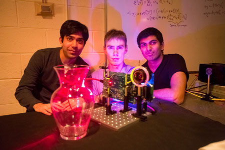 Ayush Bhandari, Refael Whyte and Achuta Kadambi pose next to their 'nano-camera'