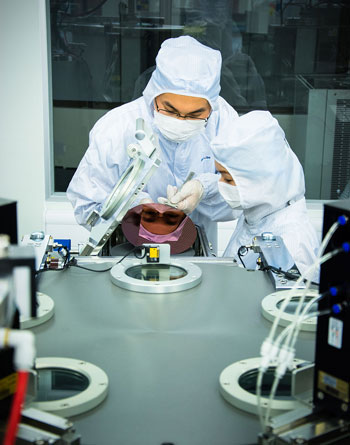 Researchers at NUS’ Graphene Research Centre working on wafer scale graphene