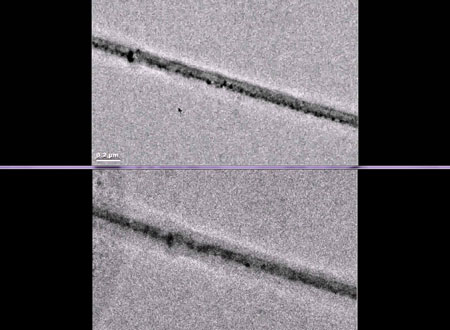 Liquid battery electrolytes makes this view of an uncharged electrode (top) and a charged electrode (bottom) a bit fuzzy