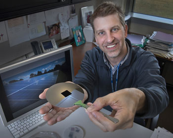 Brookhaven physicist Charles T. Black with one of his nanostructured surfaces