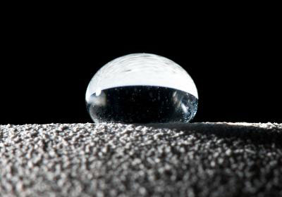 Superhydrophobic surfaces cause water like this droplet to bead up like a ball