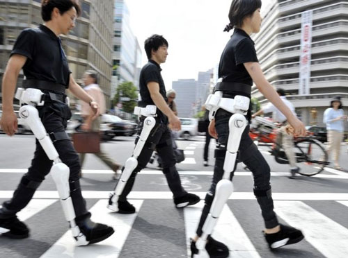 Cyberdyne employees demonstrate the robot-suit 'HAL' (Hybrid Assistive Limb) in Tokyo