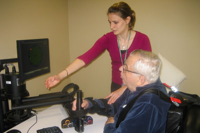 After suffering a stroke, a patient learns to operate the robot MIT-Manus to improve mobility