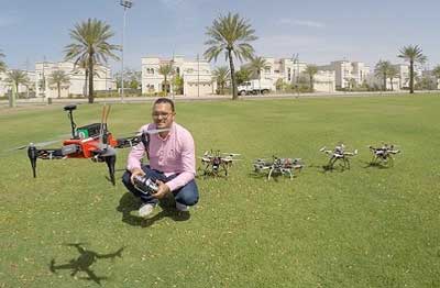 Mohamed Abdelkader with a team of unmanned aerial vehicles