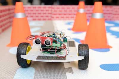 A robotic car controlled by an ultra-low power hybrid chip