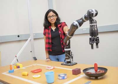 woman with robot arm