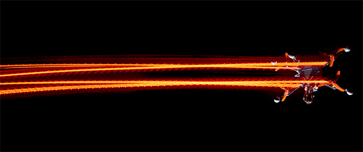 A drone racing along a time-optimal trajectory in a high-speed maneuver