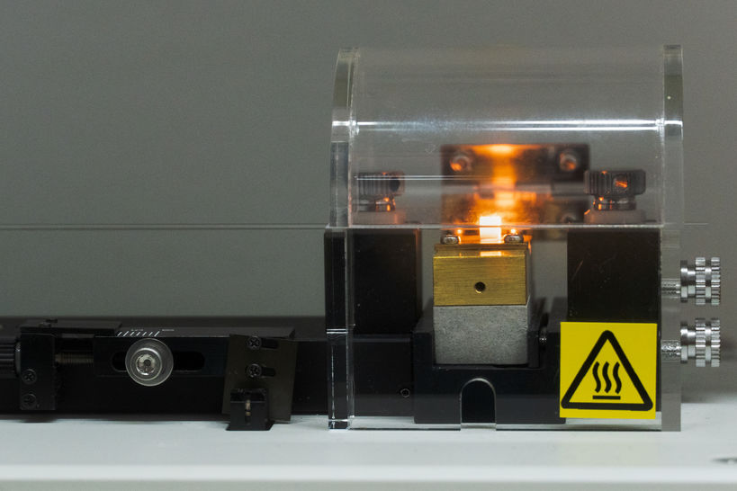 A device heats up a tiny glass tube