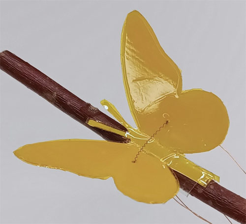 Close-up of the robot butterfly featuring the feather-light LIMA pump.