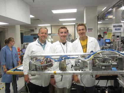 Colorado Space Grant Consortium director Chris Koehler, left, with CU-Boulder undergraduates Nathaniel Keyek-Franssen, center, and Ethan Long