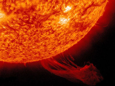 A solar prominence erupts into the sun's corona