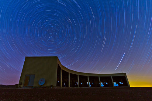 In this time-lapse photo, stars appear to rotate above the Middle Drum facility of the Telescope Array