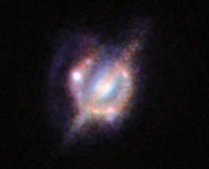 a collision that took place between two galaxies when the Universe was only half its current age