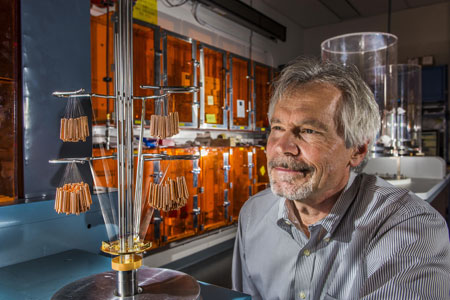 Physicist Jim Bailey of Sandia National Laboratories observes a wire array that will heat foam to roughly 4 million degrees