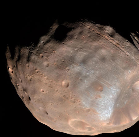 The Grooves on Mars' Moon Phobos Could Be Produced by Tidal Forces