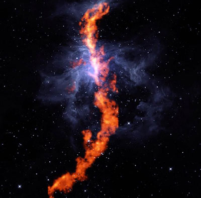 the filament of ammonia molecules appears red and Orion Nebula gas appears blue