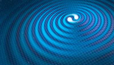 gravitational waves radiating from a pair of merging neutron stars