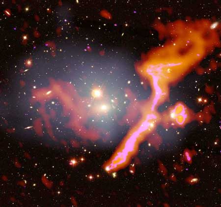 Galaxy cluster Abell 1314 with radio emission from high-speed cosmic electrons (marked in red) overlayed onto an optical image also showing hot X-ray gas (marked in grey)