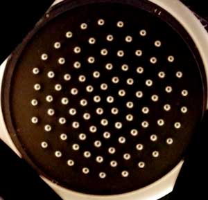 aluminum spheres placed on a conductive bowl-shaped surface