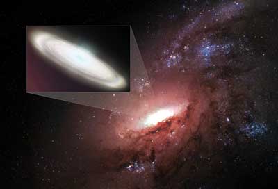 disk of water-bearing gas orbiting the supermassive black hole at the core of a galaxy