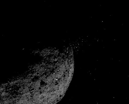 OSIRIS-REx observed small bits of material leaping off the surface of the asteroid Bennu