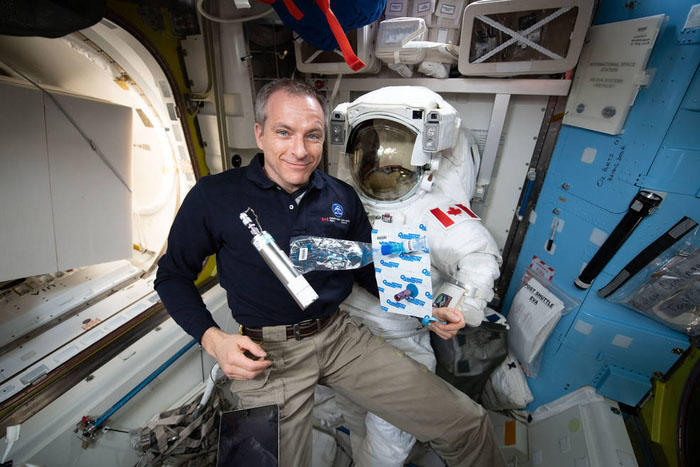 Astronaut David Saint-Jacques collecting breath, ambient air, and blood samples for the MARROW experiment