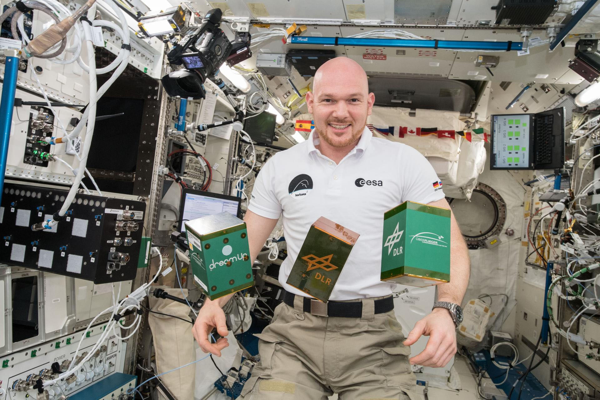 astronaut Alexander Gerst with Nanoracks modules