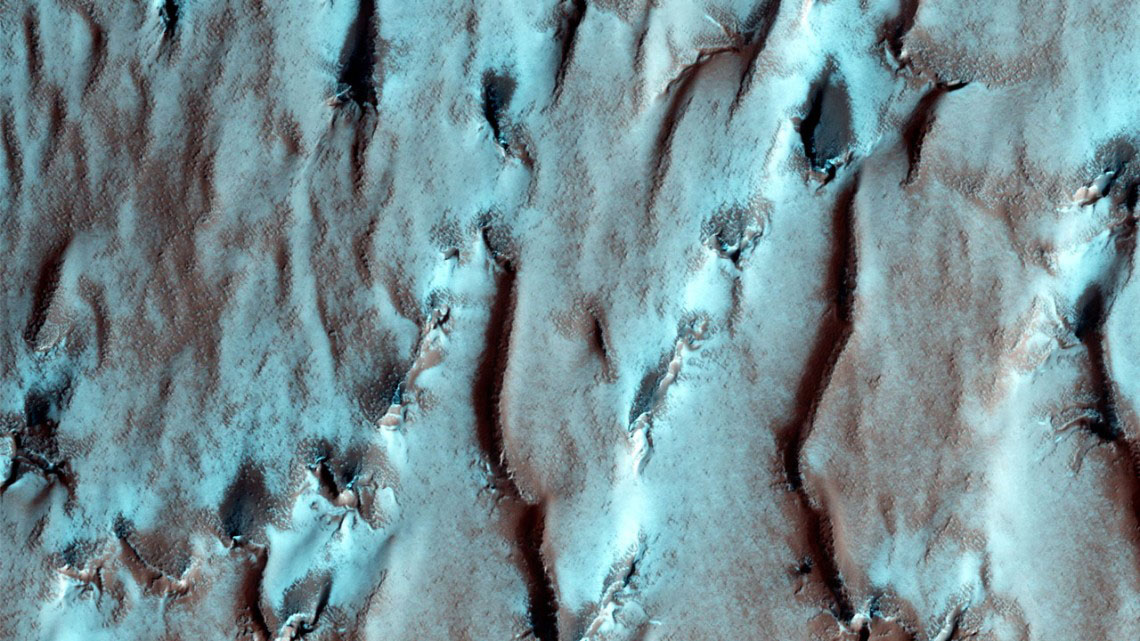 This image from NASA’s Mars Reconnaissance Orbiter shows the edge of the Martian South Pole Layered Deposit