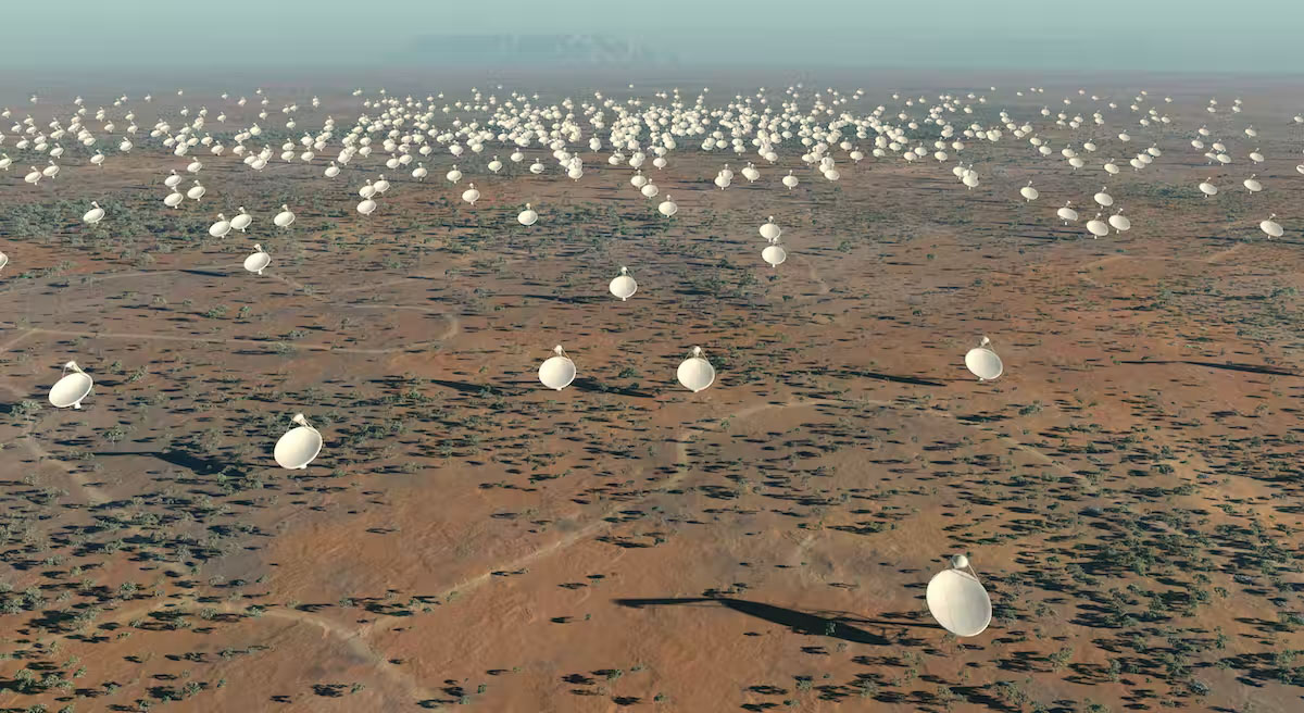 An aerial view of a desert with a huge number of satellite dishes