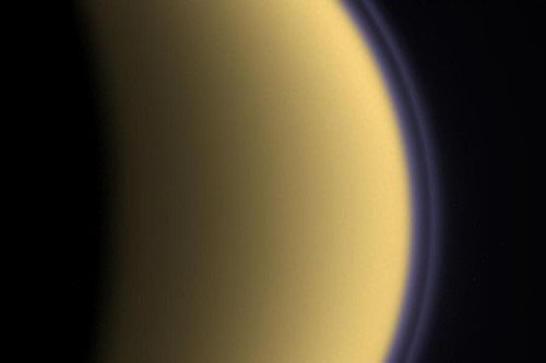Purple haze around Titan – A false-colour image of Titan captured in 2004 by the Cassini spacecraft