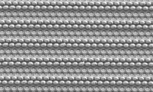Nanoscale features of a laser-driven light sail showing germanium pillars and air holes embedded in a poly(methyl methacrylate) matrix