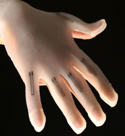 Photograph of a glove with embedded strain sensors